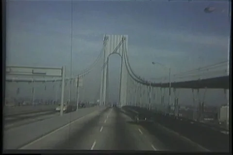 Vehicles driving on Throg's Neck Bridge - 1970 Stock Footage 99784994