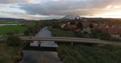Vehicles driving through bridge across the river Stock Footage 116201852