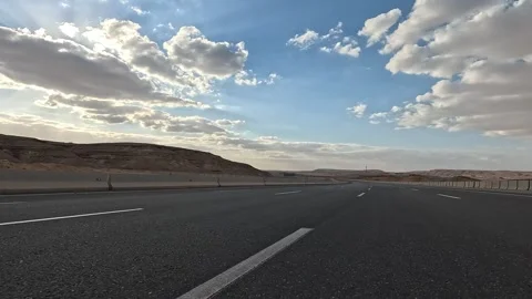 Vehicles Driving Through Desert Corridor Route From Cairo Toward Ain Sokhna 库存影片 330032257