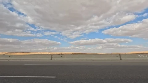 Vehicles Driving Through Desert Corridor Route From Cairo Toward Ain Sokhna Stock Footage 330051475