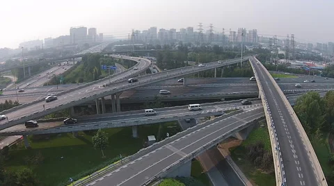 Vehicles driving through the Sihui Bridge in Beijing in the morning. Stock Footage 42404332