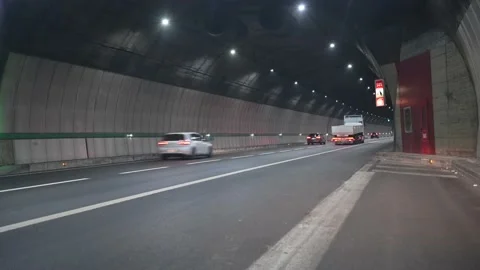  vehicles  driving through tunnel Stock Footage 167384657