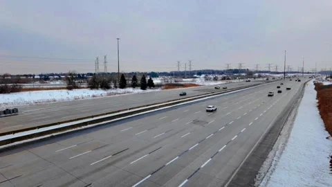 Vehicles driving on Toronto highway during winter Stock Footage 332575287