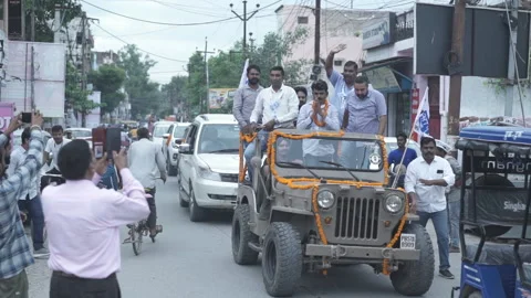 Vehicles in an election rally. Stock Footage 172185357