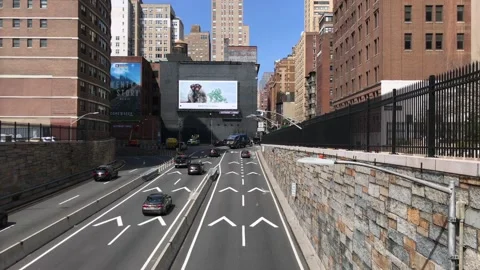 Vehicles Enter Manhattan After Exiting Queens Midtown Tunnel Stock Footage 168333994