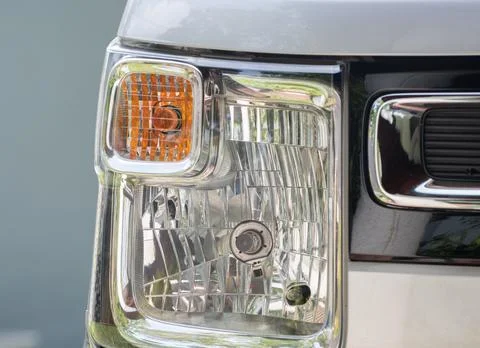 Vehicles front head lamp close up photo. Stock Photos