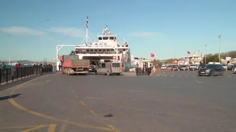 Vehicles getting on the car ferry Видео 146790645