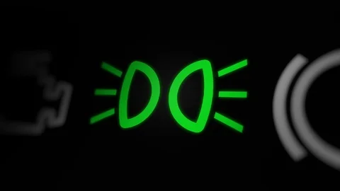 Vehicle's Headlights Turned On, Warning Light on Car Dashboard Stock Footage 124370072