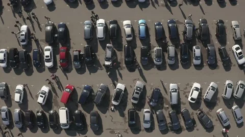 Vehicles market. View down drone footage. Crowd of buyers looking for a car. Stock Footage 201157562