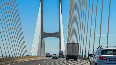 Vehicles move across the Vasco da Gama Bridge, one of Europes longest bridg.. Fotos Stock