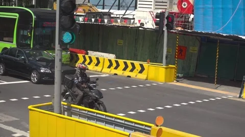 Vehicles move off at traffic light slow mo day Stock Footage 246783753