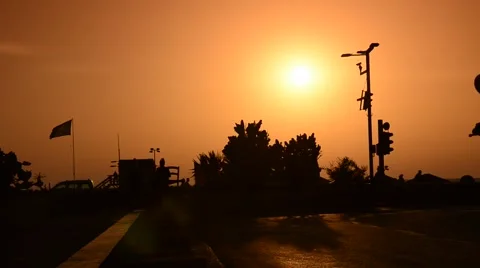 Vehicles moving on a background sunset Stock Footage 39997511