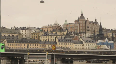 Vehicles moving on bridge in cityscape Stock Footage 65875110