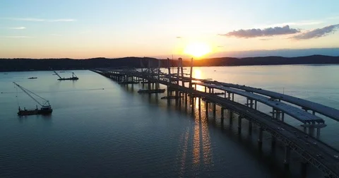 Vehicles moving on bridge during sunset Video stock 83694008