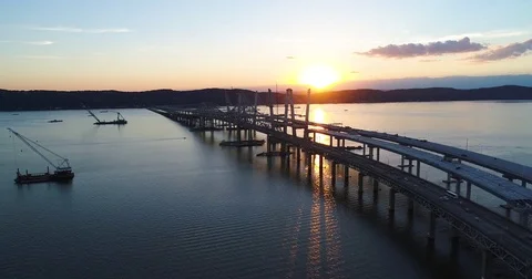 Vehicles moving on bridge during sunset Video stock 83694030