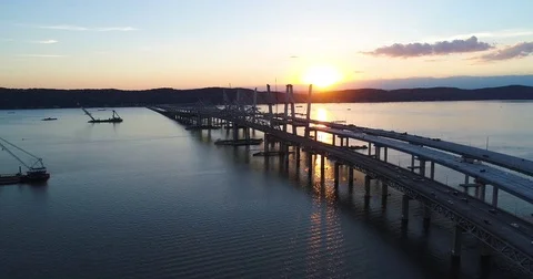 Vehicles moving on bridge during sunset Video stock 83694047