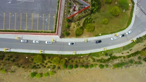 Vehicles moving forward in an orderly manner Stock-Footage 243076630