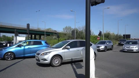 Vehicles moving on intersection tracks in the capital city on sunny day Video stock 185680537