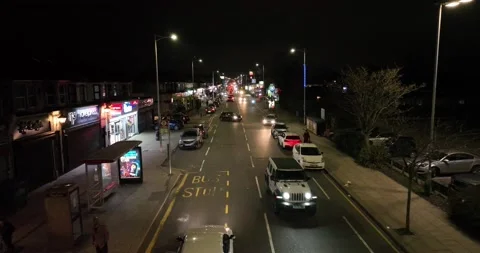 Vehicles moving on road and some are parked on road in the market area Stock-Footage 170961397