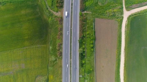 Vehicles operating on a highway, top down aerial view, oe01 Stock Footage 116748356