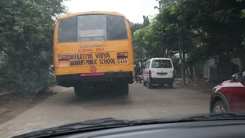 Vehicles-overtaking-school-bus-india Stock Footage 115074330