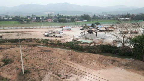 Vehicles parked in a construction site Stock Footage 265507137