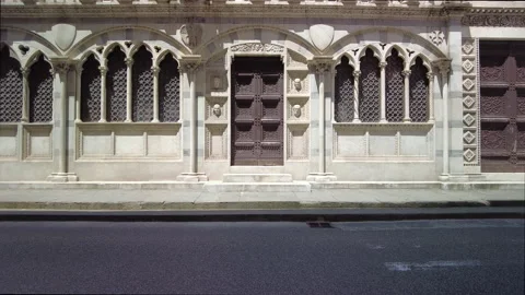 Vehicles pass the gothic chapel of Santa Maria della Spina, Pisa Stock Footage 157822009