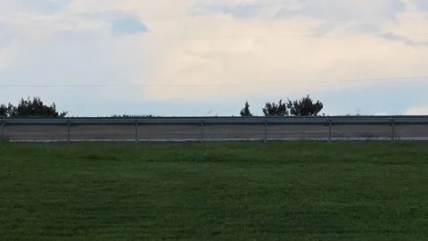 Vehicles passing on highway, car, van, and truck in motion Vidéo 307869946