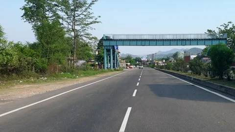 Vehicles passing through a road Stock-Footage 264844613