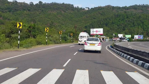 Vehicles passing through a road Stock Footage 264845089