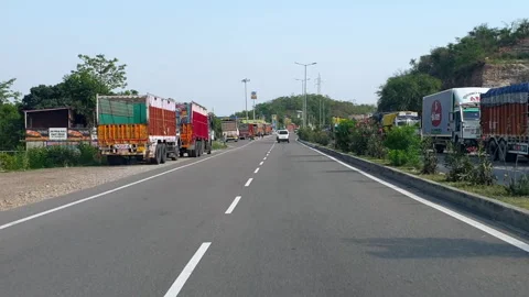 Vehicles passing through a road Stock Footage 264845562