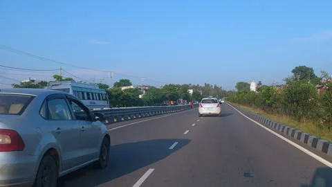 Vehicles passing through a road Stock Footage 264845977