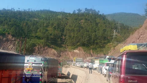 Vehicles passing through a road Stock Footage 264846281