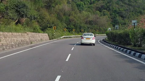 Vehicles passing through a road Stock Footage 264846450