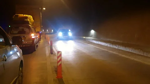 Vehicles passing through a road Stock Footage 264846689