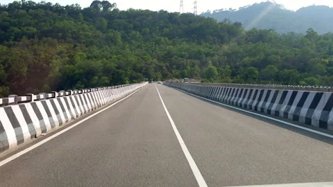 Vehicles passing through a road Stock Footage 264846964