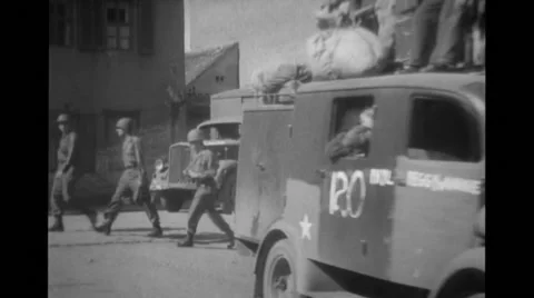 Vehicles with refugees driving by Stock Footage 39907926