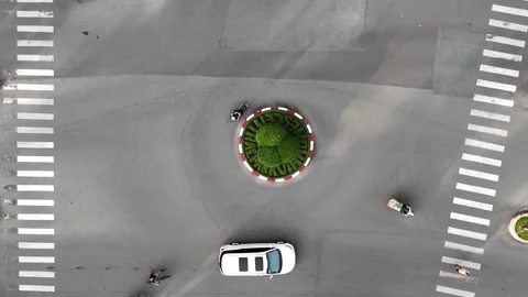 Vehicles on round about in Ho Chi Minh city, Vietnam Stock Footage 293227006