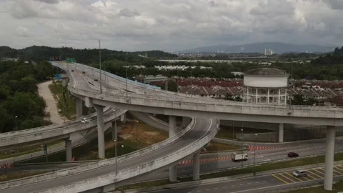 Vehicles traffic flow highway flyover overpass lanes at Puncak Perdana Selangor Stock Footage 231103777