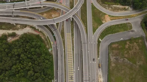 Vehicles traffic flow highway flyover overpass lanes at Puncak Perdana Selangor Stock Footage 231105177