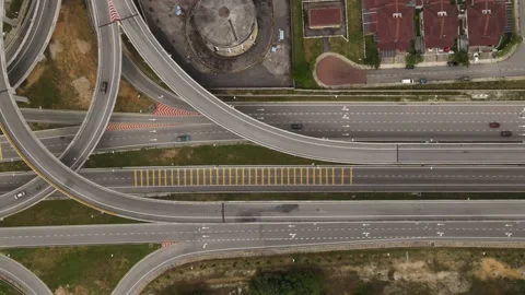 Vehicles traffic flow highway flyover overpass lanes at Puncak Perdana Selangor Stock Footage 231105489