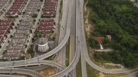 Vehicles traffic flow highway flyover overpass lanes at Puncak Perdana Selangor Stock Footage 231105633