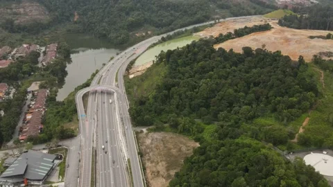 Vehicles traffic flow highway flyover overpass lanes at Puncak Perdana Selangor Stock Footage 231105708