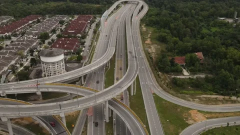 Vehicles traffic flow highway flyover overpass lanes at Puncak Perdana Selangor Stock Footage 231106124
