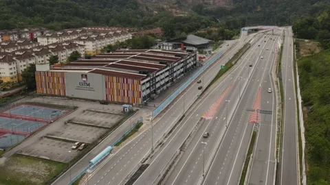 Vehicles traffic flow highway flyover overpass lanes at Puncak Perdana Selangor Stock Footage 231106880