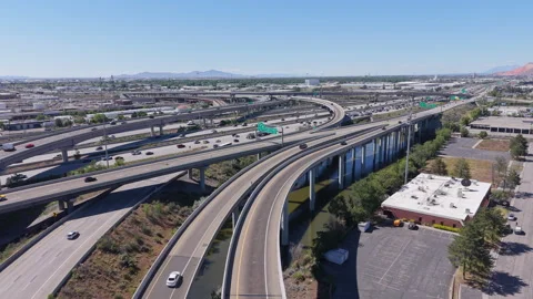 Vehicles travel through the complex SLC Spaghetti Bowl Interchange Stock Footage 341896984
