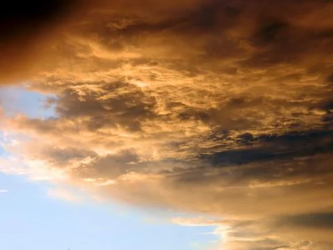A veil of thunderclouds clouds the sky Stock Photos