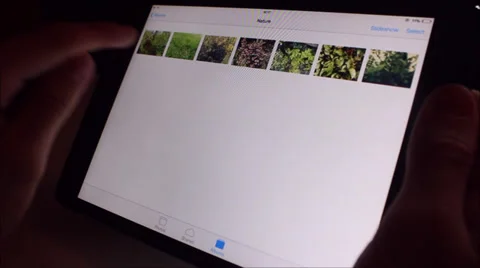 Veiwing photos on a tablet computer Stock-Footage 37085395