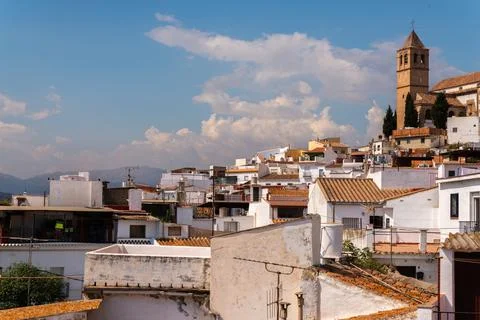 VELEZ-MALAGA, SPAIN - AUGUST 17, 2018 view of buildings in small town in Spai Stock Photos