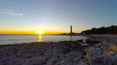 Veli Rat lighthouse and a Sunset Stock Footage 63164245